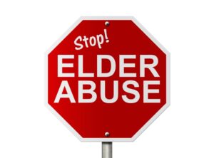 An American road sign with the words "Stop Elder Abuse" isolated on a white background, emphasizing the message "Stop Elder Abuse."