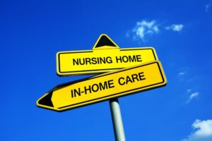 A traffic sign with two options, "Nursing Home" or "In-Home Care," representing the decision between types of senior housing for older and elderly people.